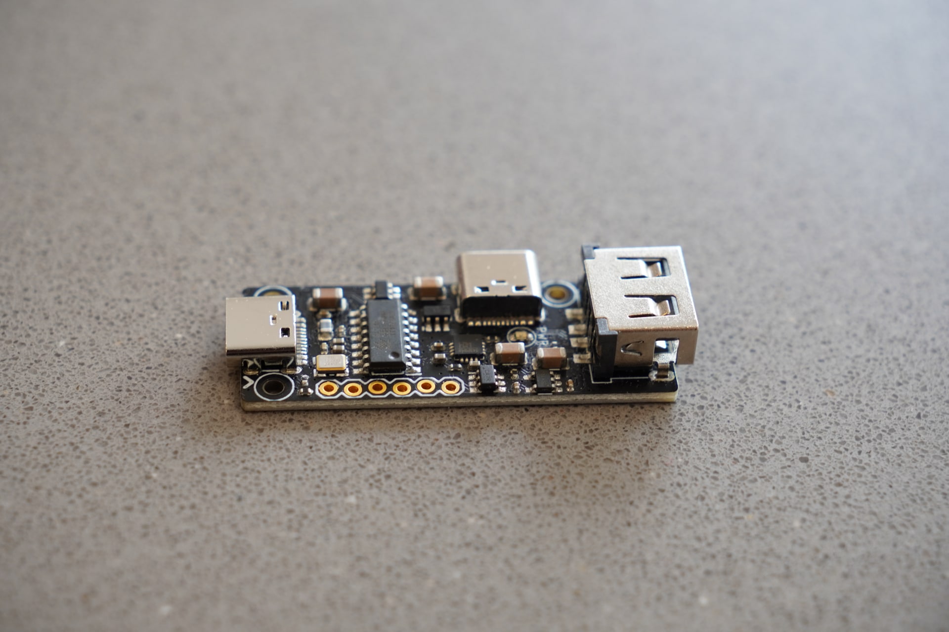Top view of the pt1 board showing its USB-C, USB-A and header connections
